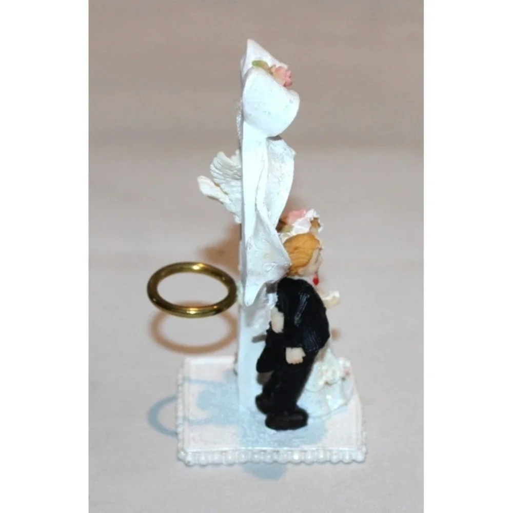 vintage bride & groom wedding cake topper with dove & ring in back